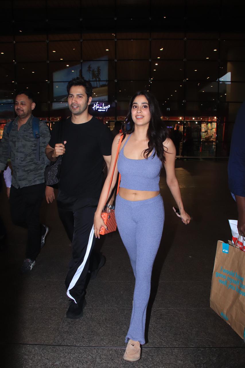 Janhvi and Varun both exuded airport fashion in comfy yet trendy choices, with Janhvi in a vibrant blue co-ord set and Varun in an all black ensemble